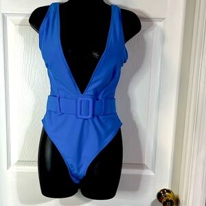Pretty royal blue one piece swim suit, size medium, NWT.